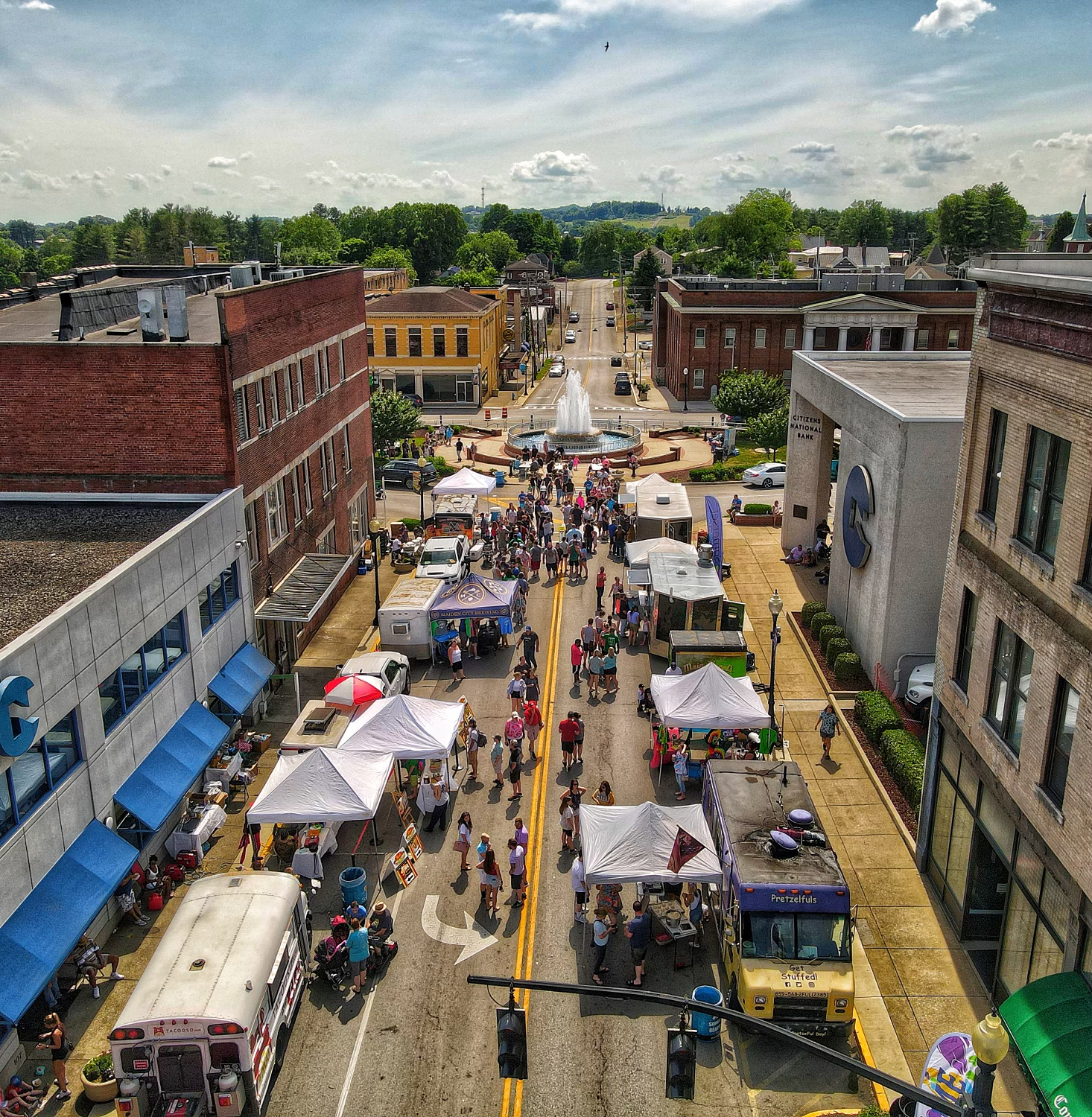 aerial photo of downtown street filled with foodtrucks