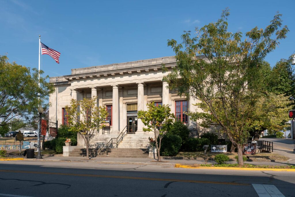 Large building with stone steps and columns