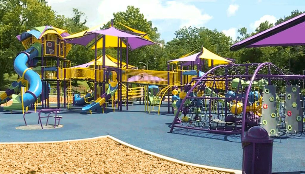 colorful playground with climbing and sliding areas
