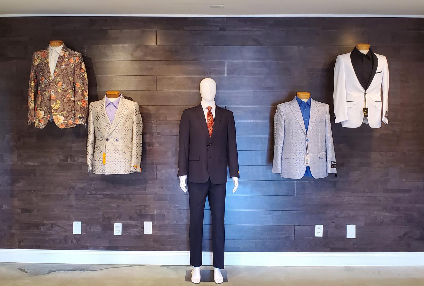 display of suits with mannequin